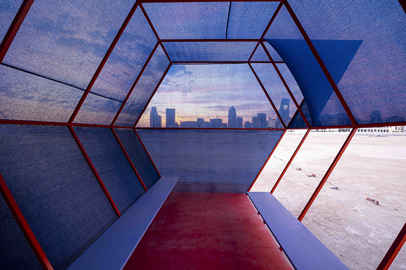 colorful angular volumes shape resting bleachers for cricket players in qatar