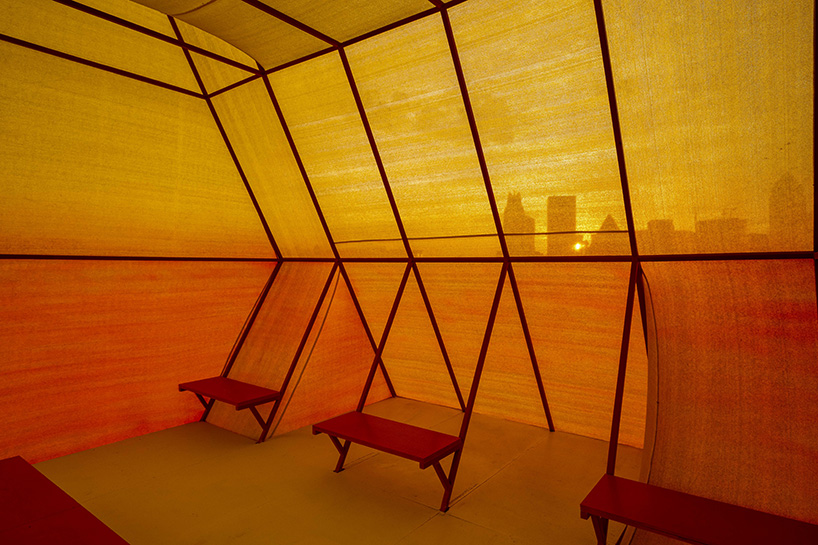 colorful angular volumes shape resting bleachers for cricket players in qatar