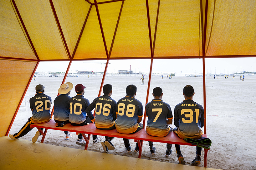 colorful angular volumes shape resting bleachers for cricket players in qatar