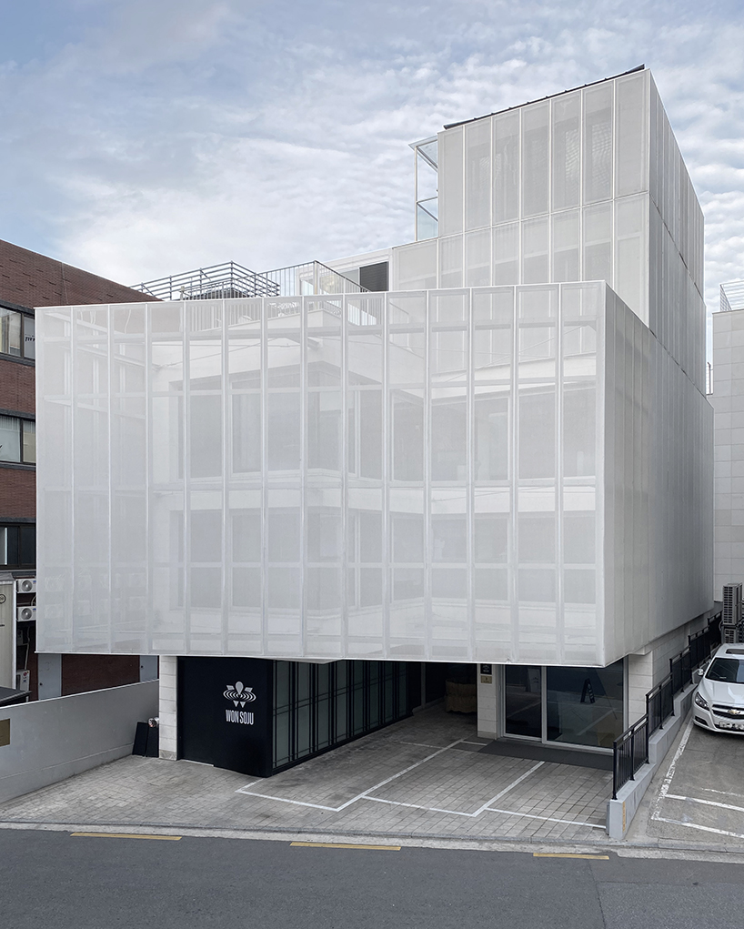 mesh membrane facades enfold archiworkshop's sinsa S8 commercial building in seoul