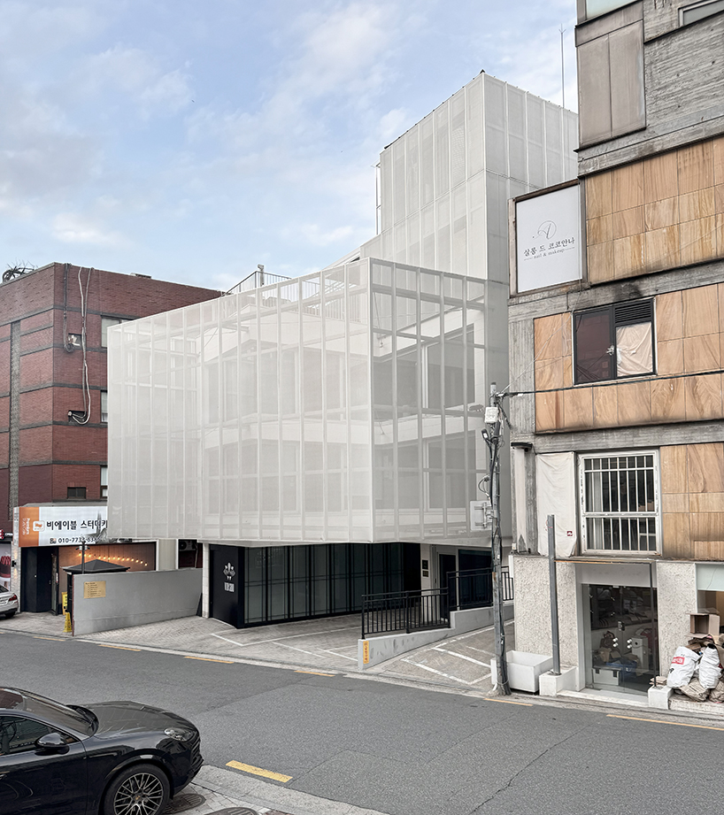 mesh membrane facades enfold archiworkshop's sinsa S8 commercial building in seoul
