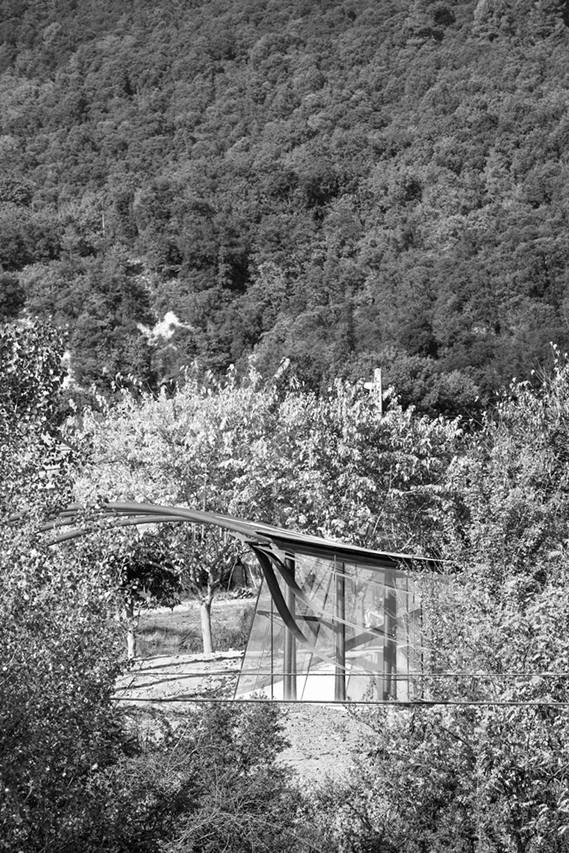 miquel subiras' organic-shaped cultural center in spain mimics its surrounding nature