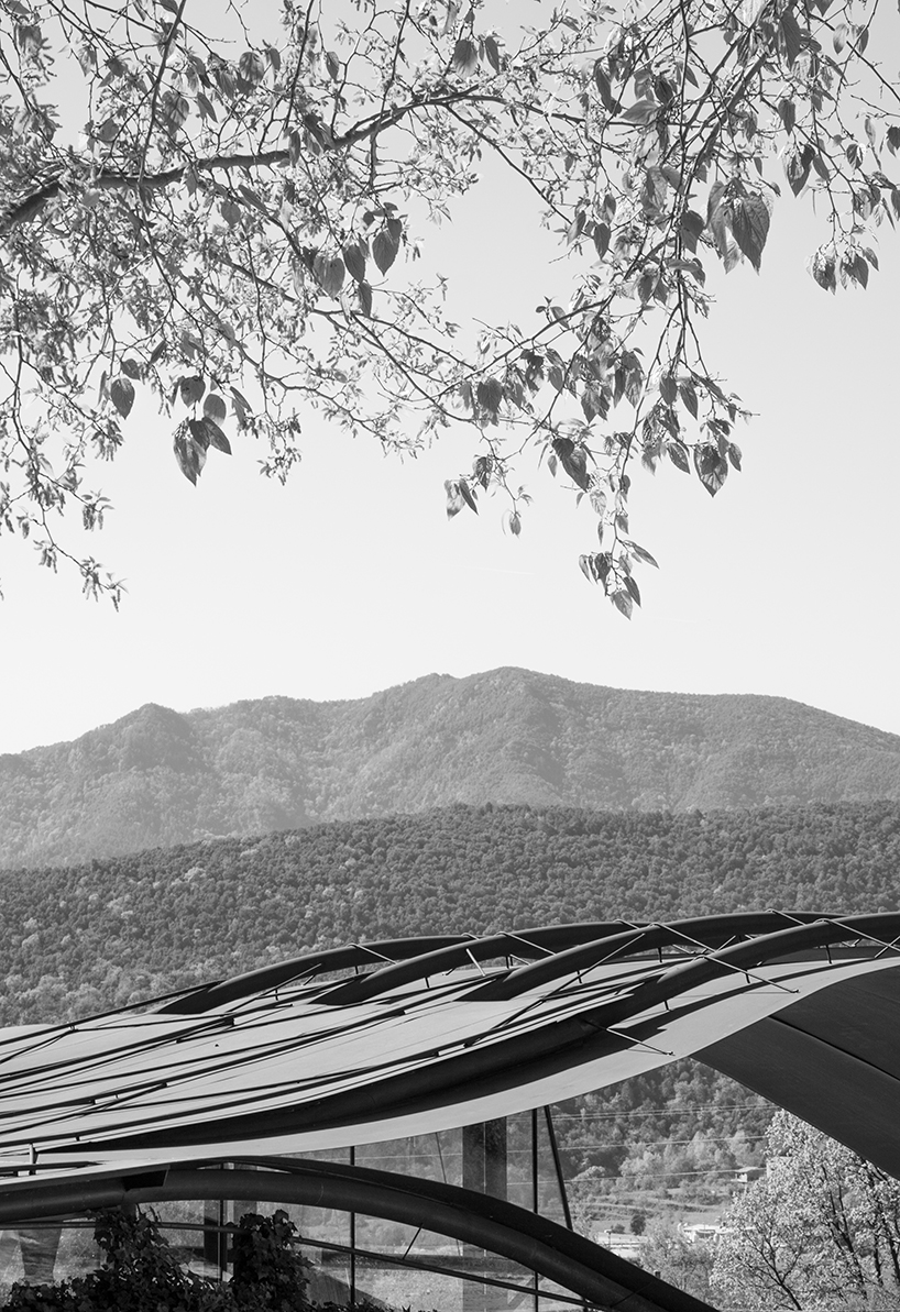 miquel subiras' organic-shaped cultural center in spain mimics its surrounding nature