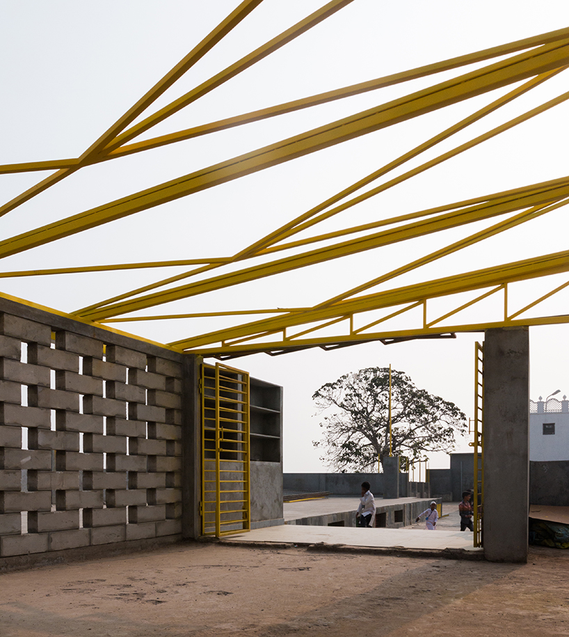 designaware presents a school carved from a cliff in the heritage precinct of golconda