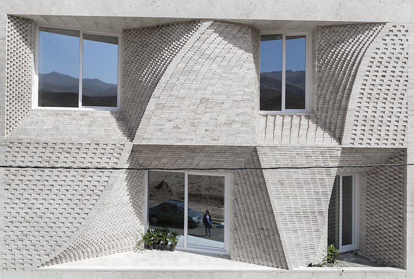 travertine building in mahallat, iran, is decorated by brick patterns ...