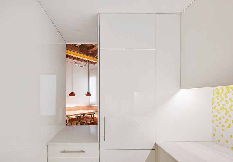 miel arquitectos refurbishes traditional spanish house into a contemporary mirror-clad apartment