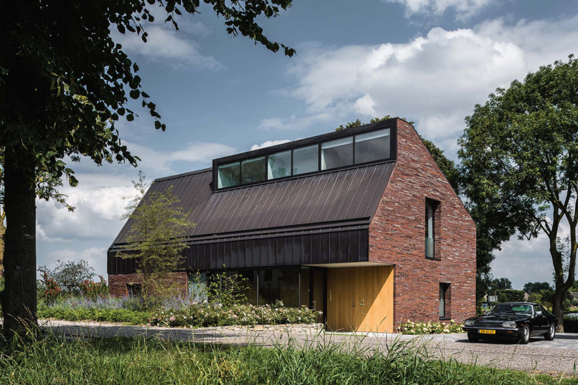 EVA designs a copper roofed contemporary house in a dutch ribbon development