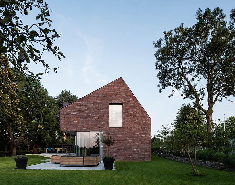 EVA designs a copper roofed contemporary house in a dutch ribbon development