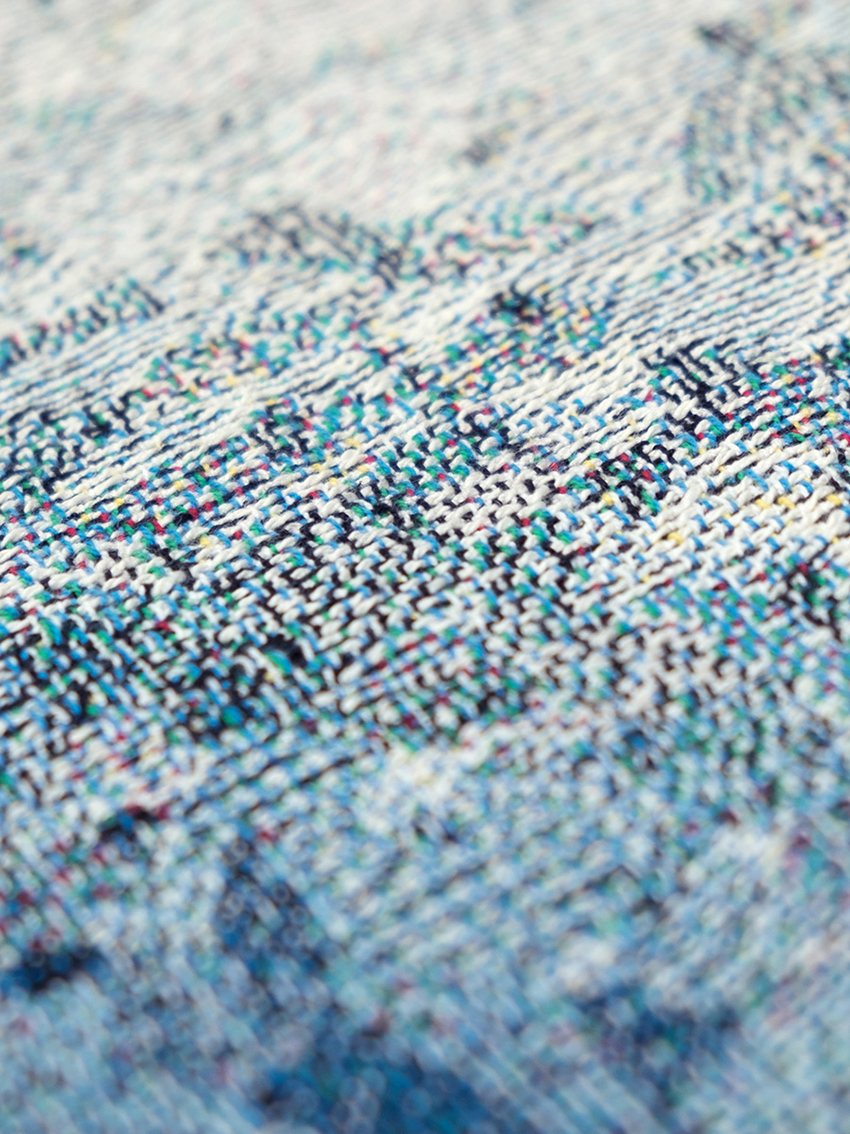 hiller dry goods converts world currencies into colorful and abstract blankets