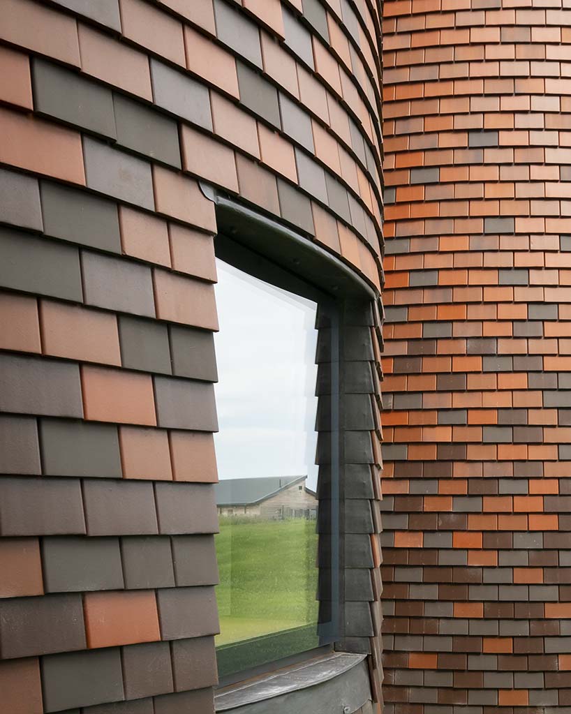 acme creates a contemporary oast house amid the rolling landscape of kent, england designboom