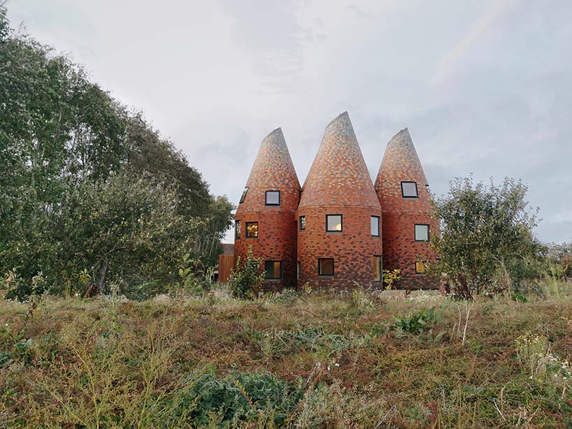 acme creates a contemporary oast house amid the rolling landscape of kent, england designboom