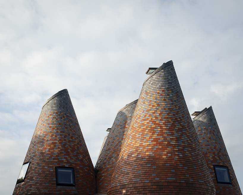 acme creates a contemporary oast house amid the rolling landscape of kent, england designboom