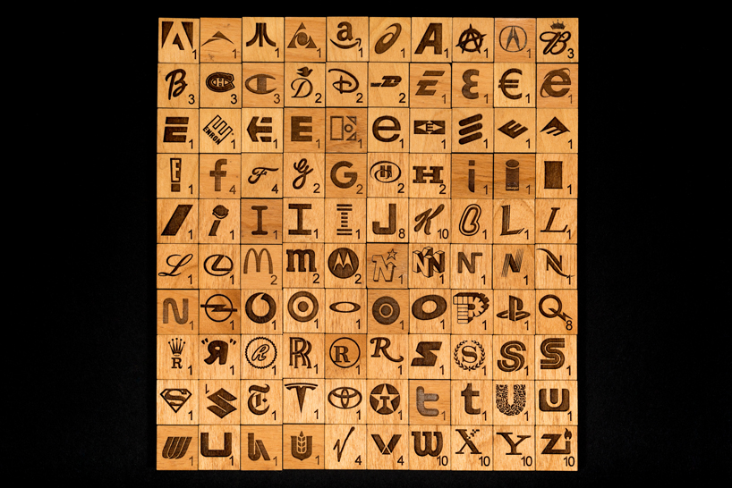 emmanuel laflamme develops a scrabble edition using company logos on wooden tiles