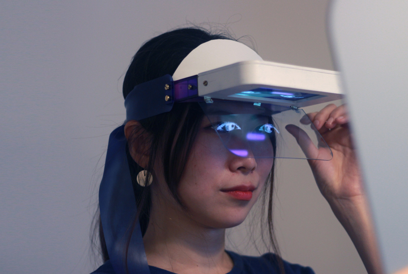 eun kyung shin's social mask is an AI gadget that displays human emotion in real time
