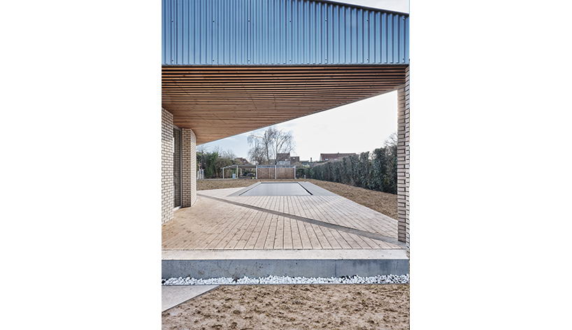 notan office combines bold geometries with angled windows in belgian residence