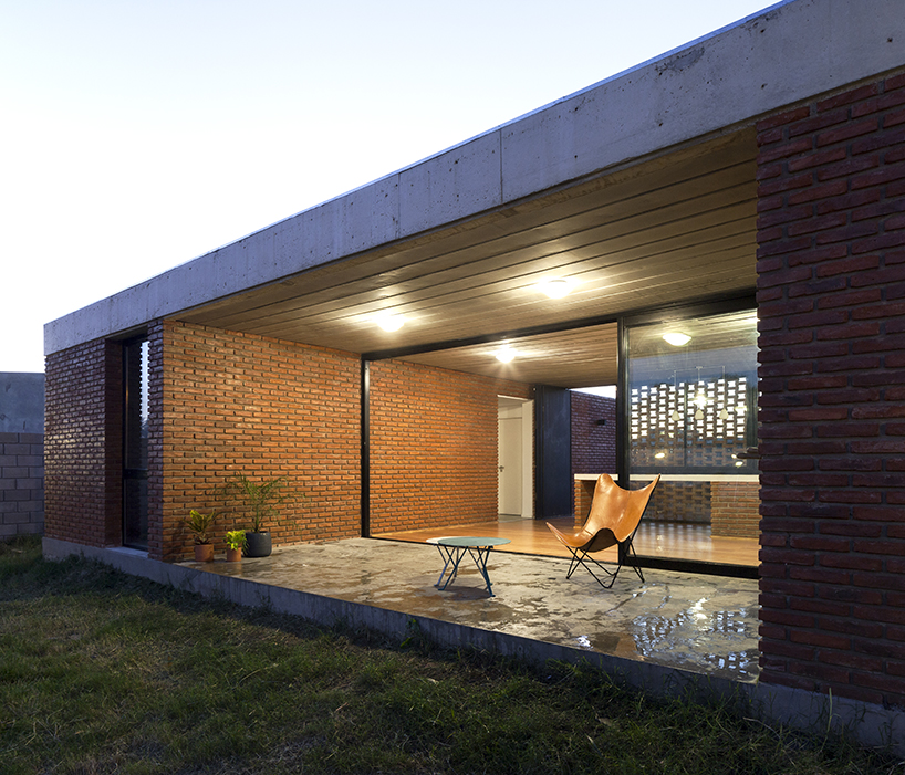 estudio papa uses brick and local techniques to integrate casa TR to buenos aires' urban sprawl