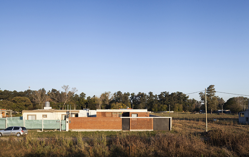 estudio papa uses brick and local techniques to integrate casa TR to buenos aires' urban sprawl