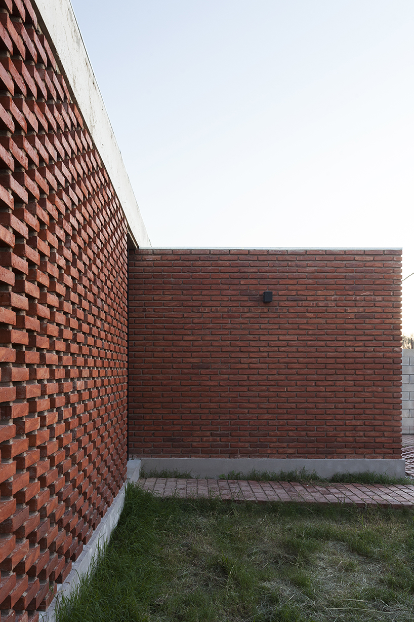 estudio papa uses brick and local techniques to integrate casa TR to buenos aires' urban sprawl
