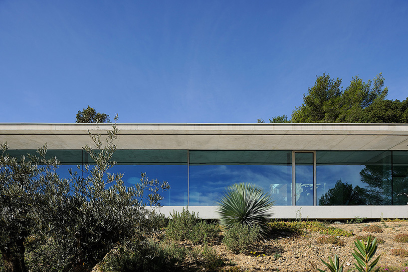 aum's stone and concrete la mira ra house in france offers intimate sea views