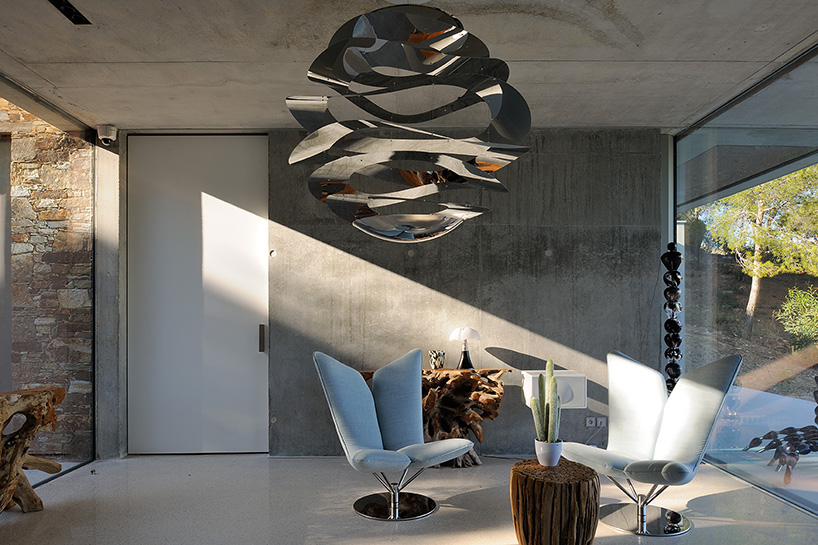 aum's stone and concrete la mira ra house in france offers intimate sea views