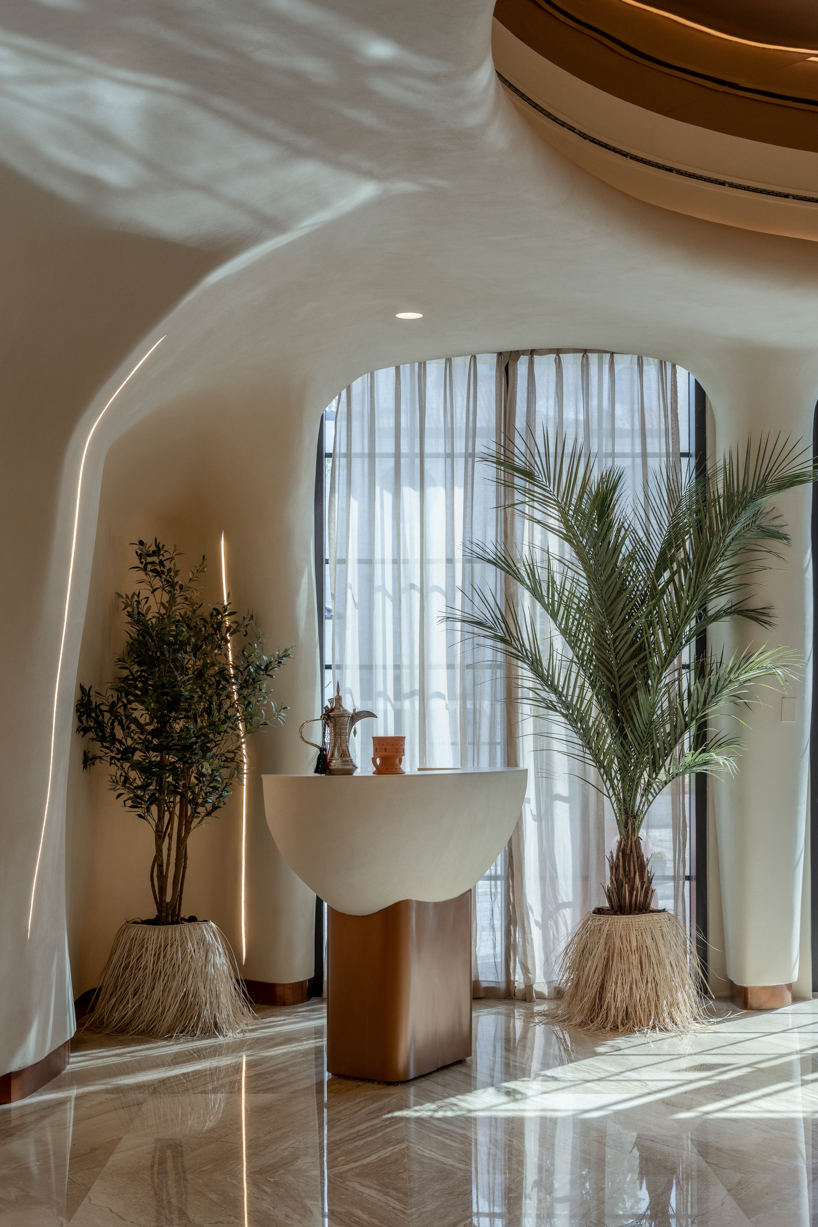 falwa restaurant transforms arabian equestrian heritage into fluid architectural interior - 9