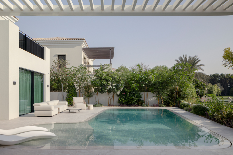 travertine, timber, and desert-toned textures shape groundeddesign’s villa limni in dubai - 2