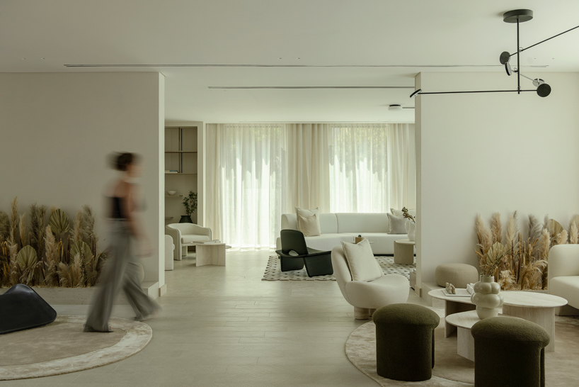 travertine, timber, and desert-toned textures shape groundeddesign’s villa limni in dubai - 6