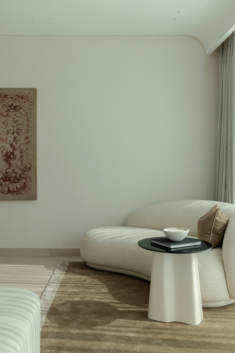 travertine, timber, and desert-toned textures shape groundeddesign’s villa limni in dubai - 7