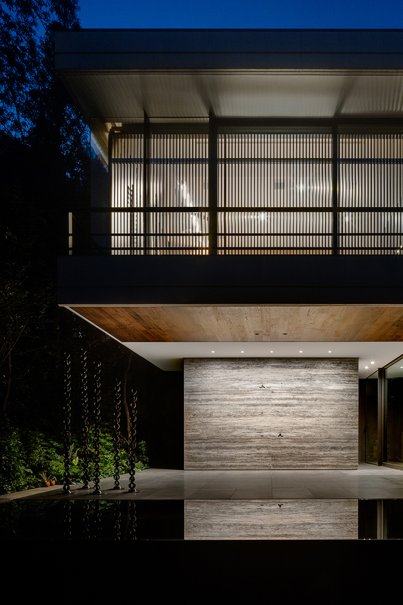 BERNARDI + PESCHARD / BLANCASMORAN design a family house in mexico city using natural stone and timber