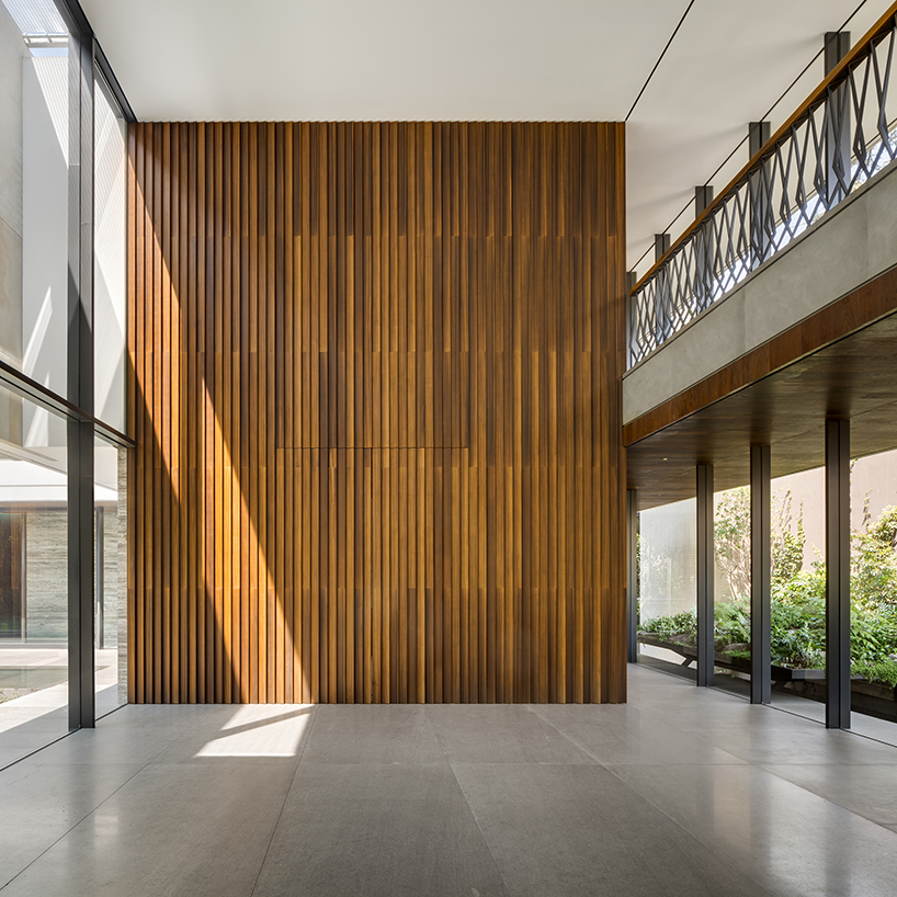 BERNARDI + PESCHARD / BLANCASMORAN design a family house in mexico city using natural stone and timber