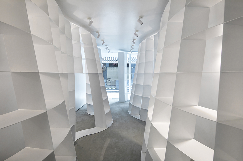 aether architects' concave and convex book pavilion in shenzhen