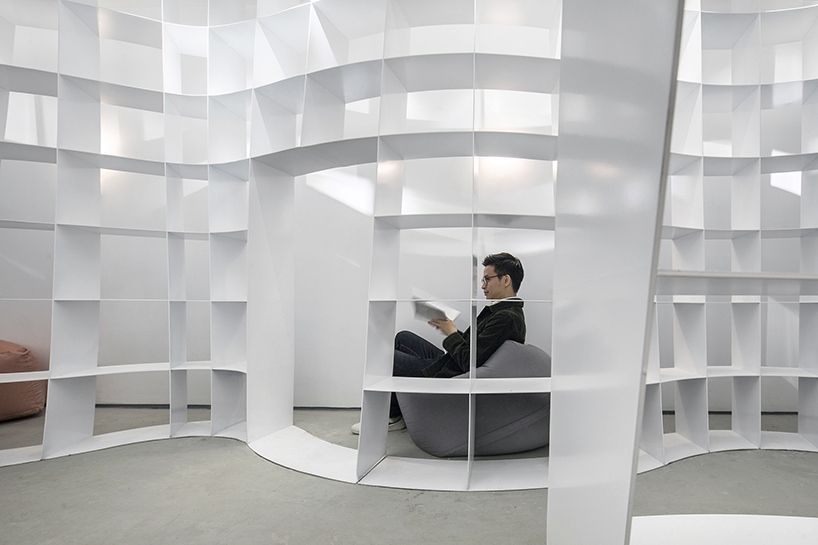 aether architects' concave and convex book pavilion in shenzhen