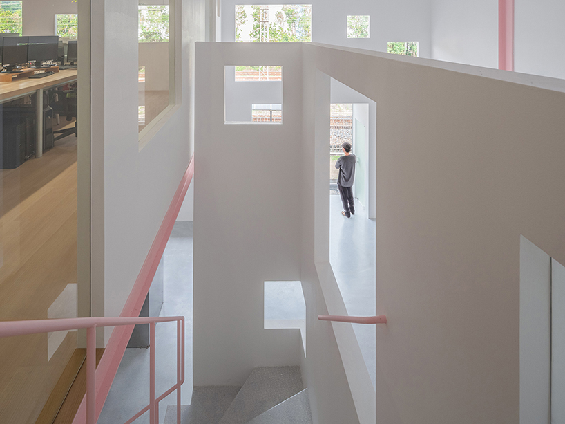 layered transparent walls transform former railway warehouse in shenzhen - 9