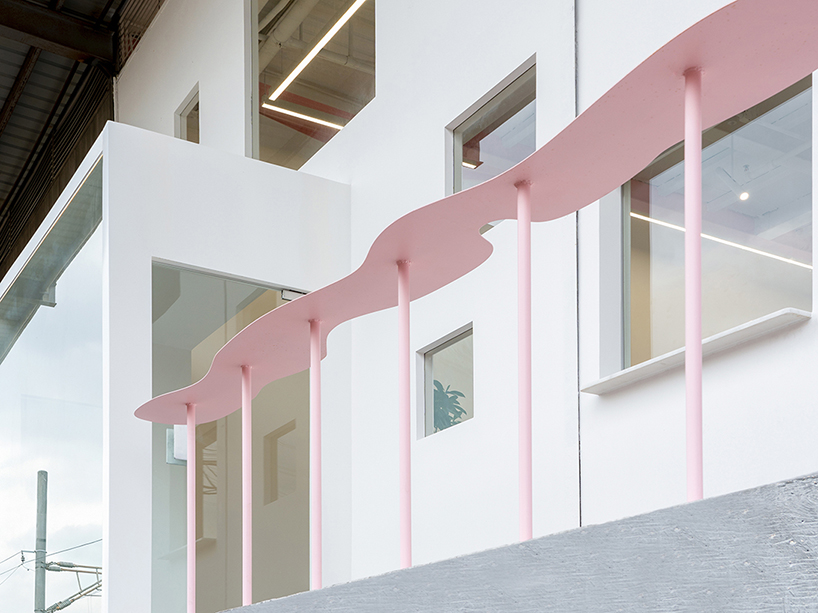 layered transparent walls transform former railway warehouse in shenzhen - 10