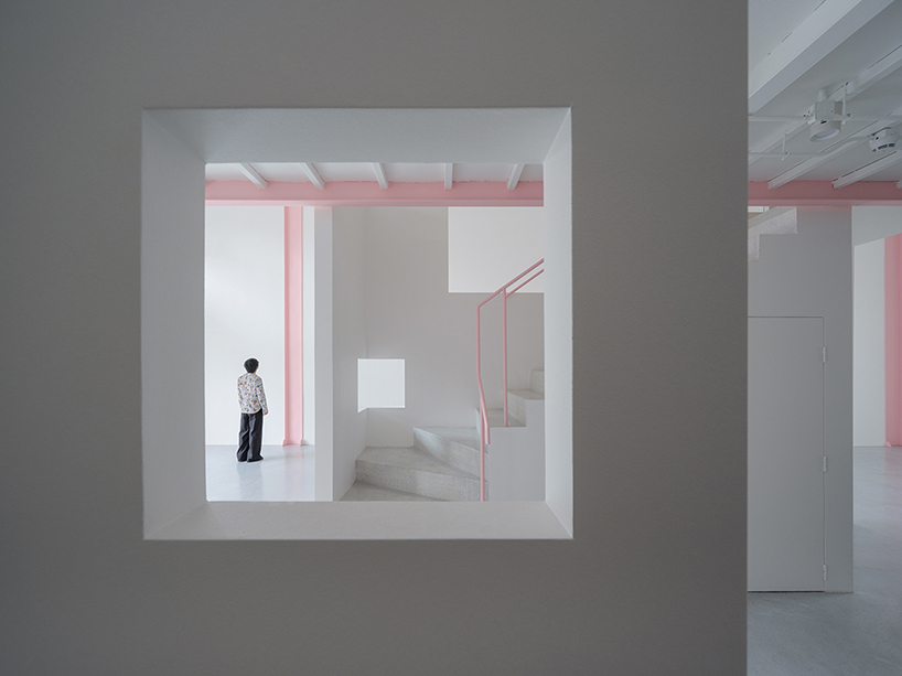 layered transparent walls transform former railway warehouse in shenzhen - 7