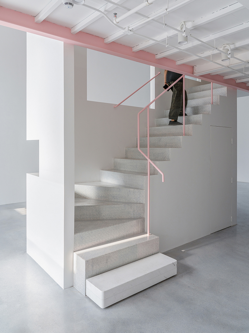 layered transparent walls transform former railway warehouse in shenzhen - 8