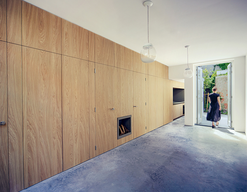 bláha architecture + design renovates a traditional courtyard house in the hague designboom