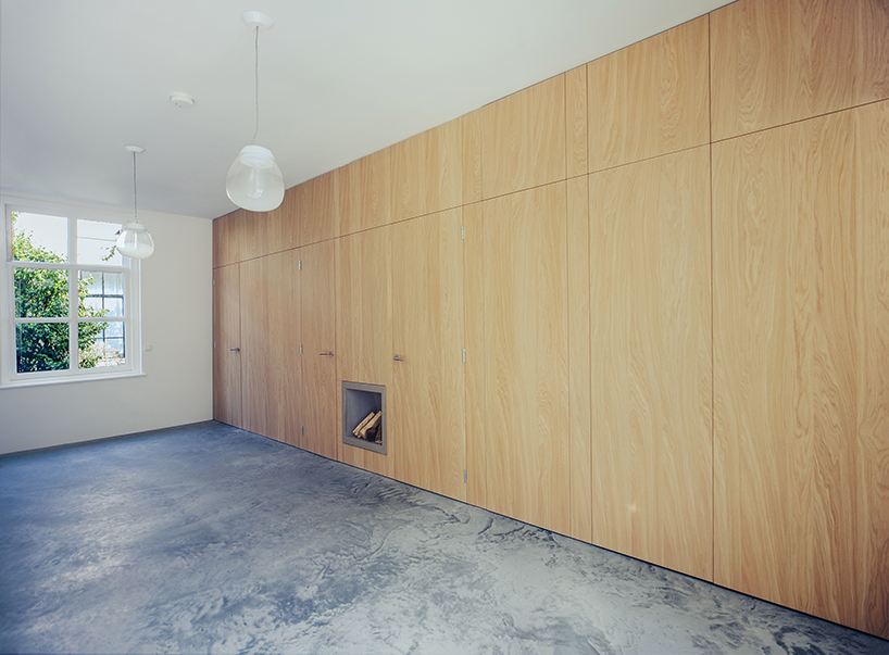 bláha architecture + design renovates a traditional courtyard house in the hague designboom