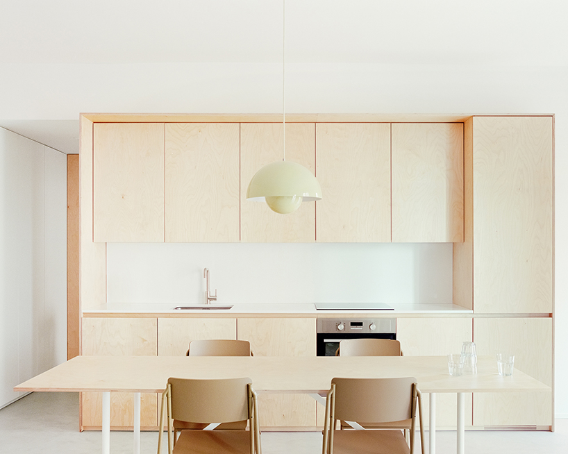 hybrid renovation by SET architects combines flexible living and working in milan