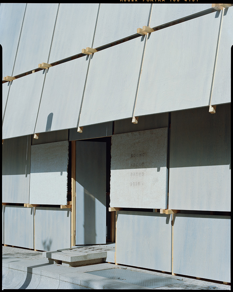 leopold banchini's temporary timber bathhouse reclaims traffic roundabout in logroño, spain