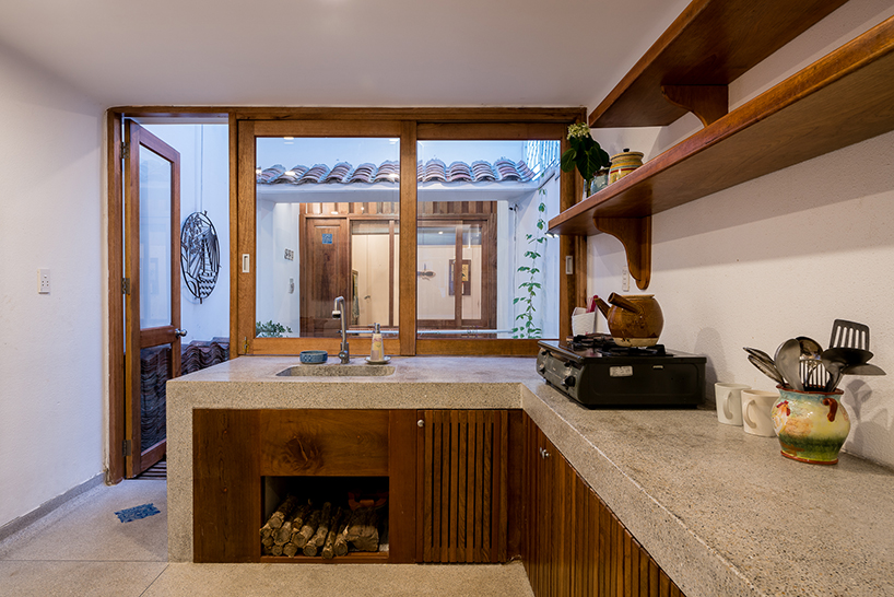 time architects renovates an old family vietnamese house using locally sourced materials