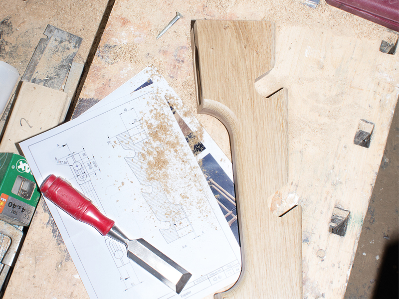 work out in style with atelier oraviva's solid oak wall bar