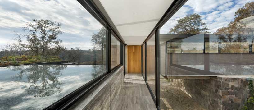 ZD+A designs a family house in mexico using local stone to create a dialogue with nature