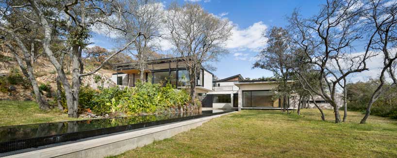 ZD+A designs a family house in mexico using local stone to create a dialogue with nature