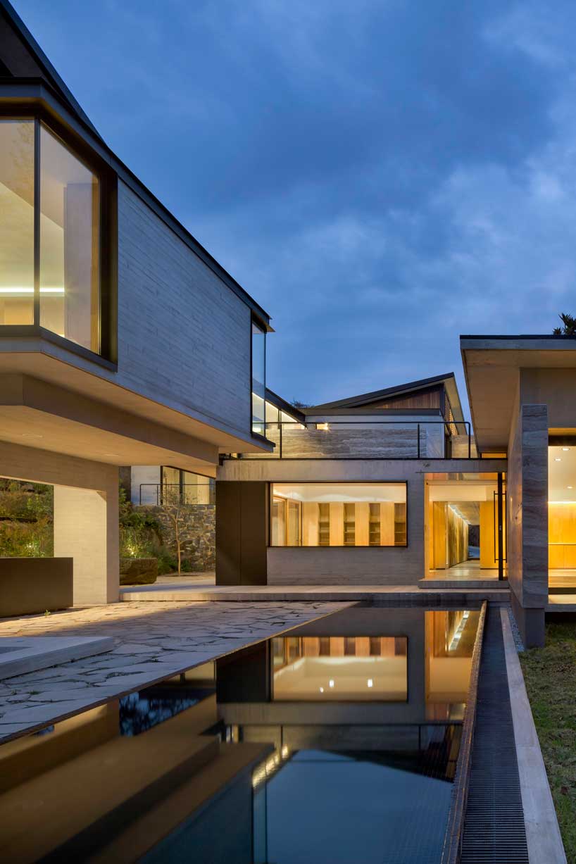 ZD+A designs a family house in mexico using local stone to create a dialogue with nature