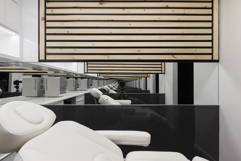 atelier RZLBD creates the illusion of endless space inside tiny 5.4 sqm dentist