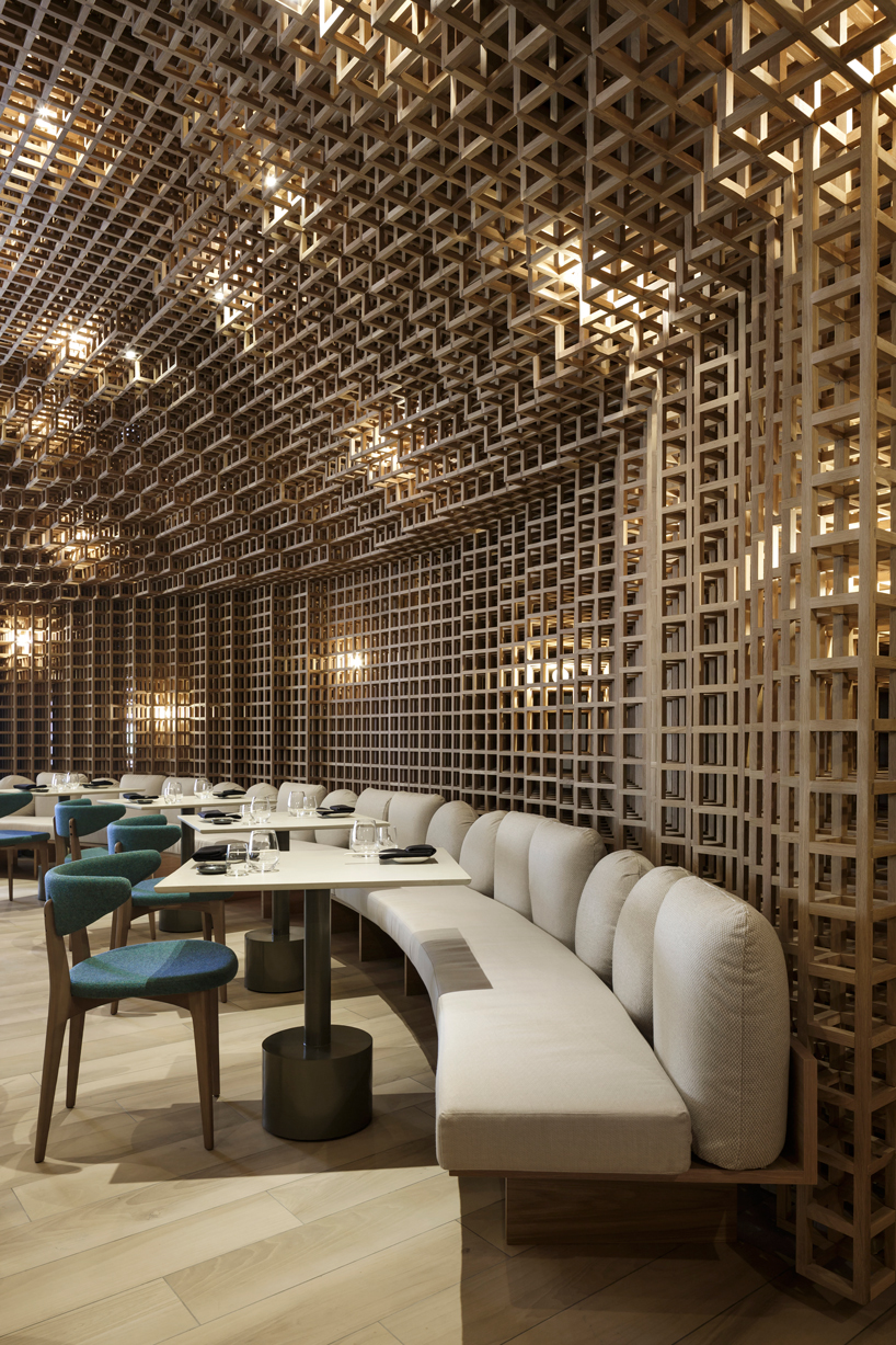 studio arthur casas installs detailed woodwork piece within kosushi restaurant in miami
