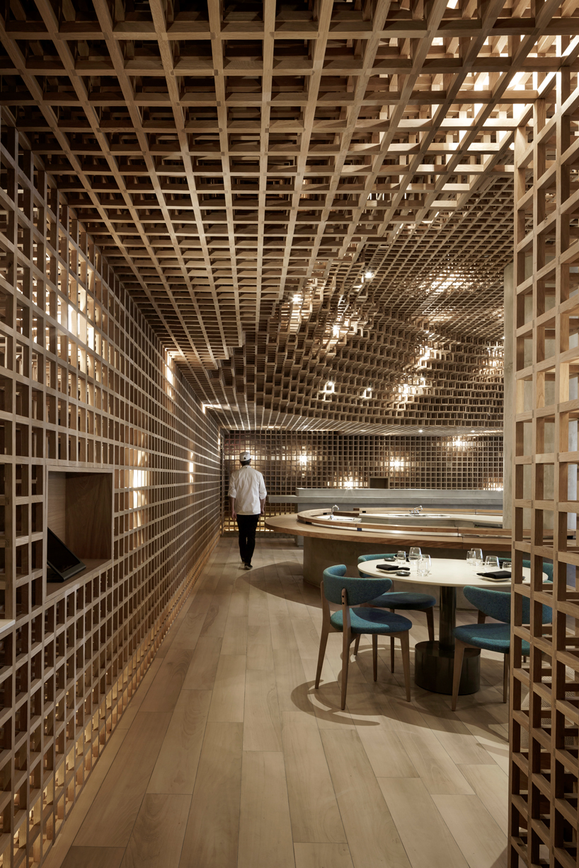 studio arthur casas installs detailed woodwork piece within kosushi restaurant in miami