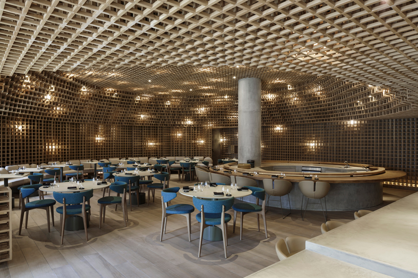 studio arthur casas installs detailed woodwork piece within kosushi restaurant in miami