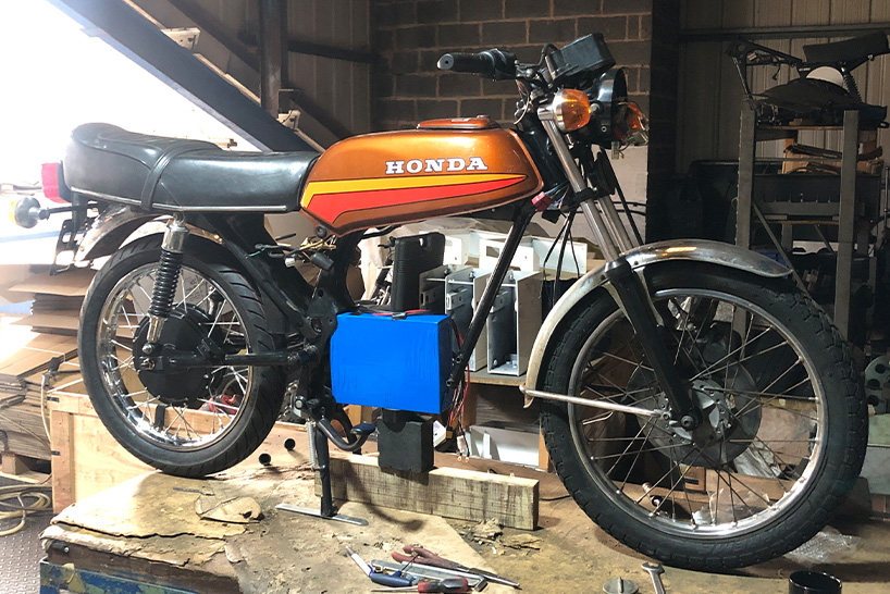 retrofitted honda motorcycle with 2000w electric hub motor 7